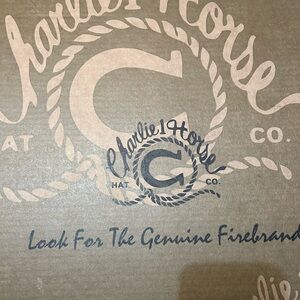 Never worn or taken out of box only for these picture